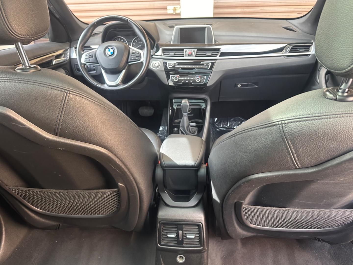 2016 Gray /Black BMW X1 leather (WBXHT3Z34G4) with an 4 CYLINDER engine, Automatic transmission, located at 30 S. Berkeley Avenue, Pasadena, CA, 91107, (626) 248-7567, 34.145447, -118.109398 - Crown City Motors is a used “Buy Here Pay Here” car dealer in Pasadena CA. “Buy Here Pay Here” financing, means that when you purchase your vehicle from our dealership, that you make the payments to the dealership as well. We do not need the banks approval to get you approved for a used auto - Photo#21